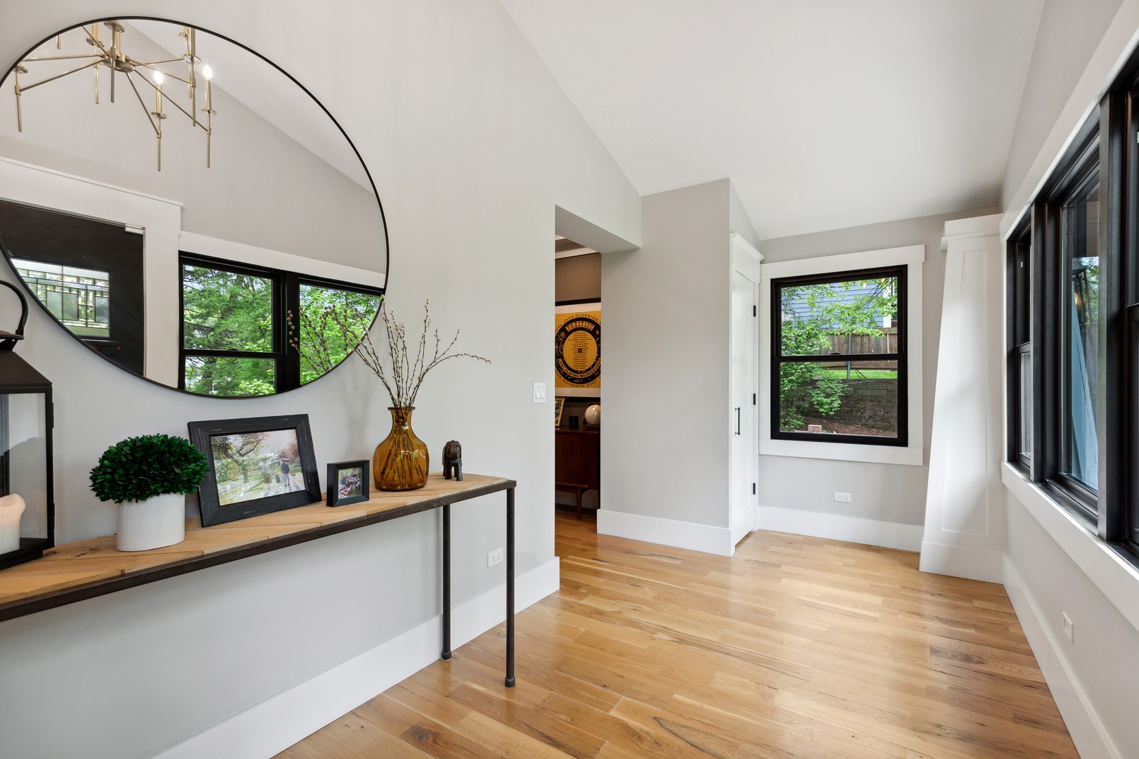 112 Beachway Drive Fox River Grove, IL 60021 - Photo 7 of 37 a view of an entryway with wooden floor and windows