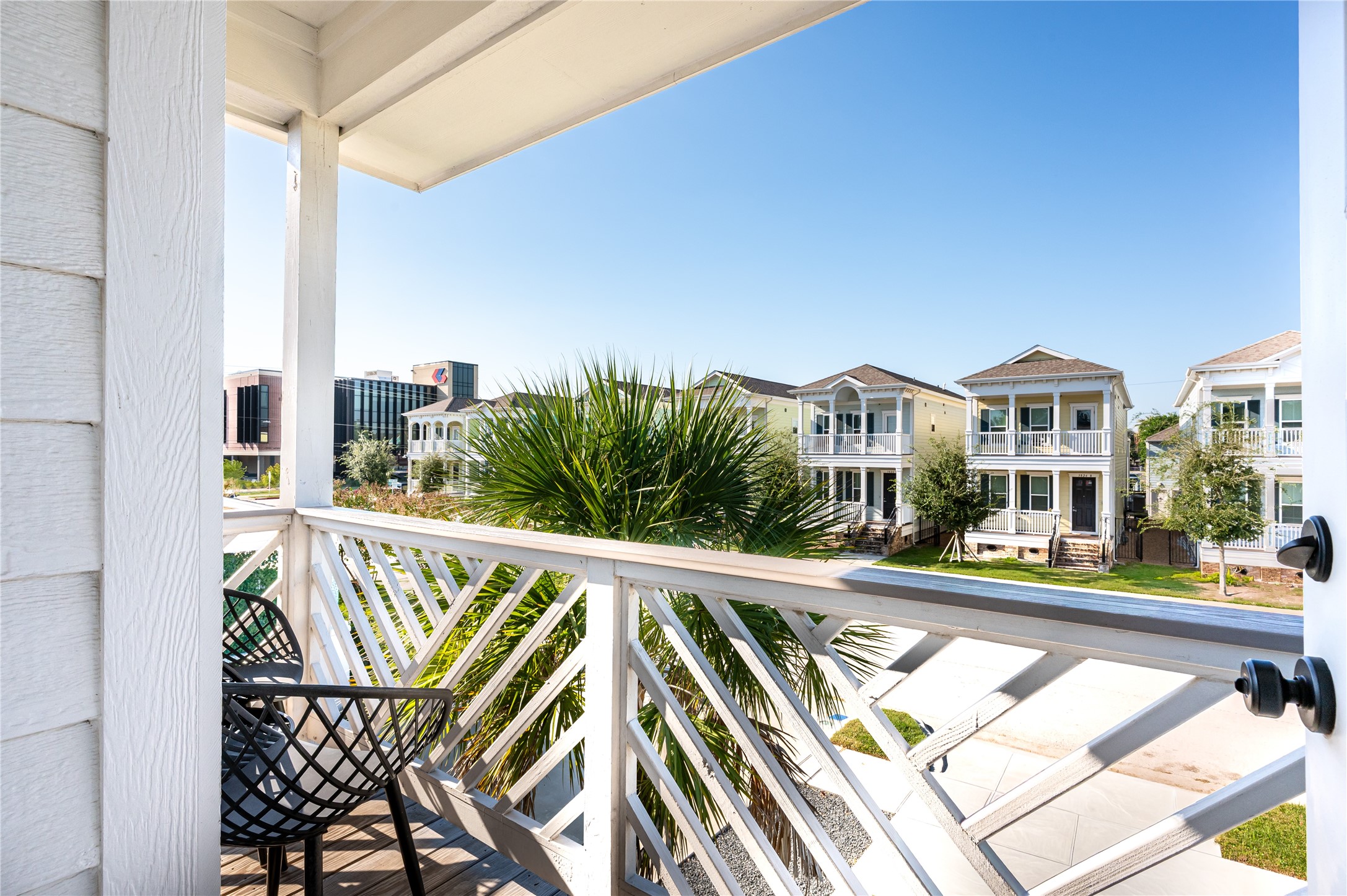 3817 Avenue R Galveston, TX 77550 - Photo 16 of 35 a view of balcony with wooden floor and outdoor seating