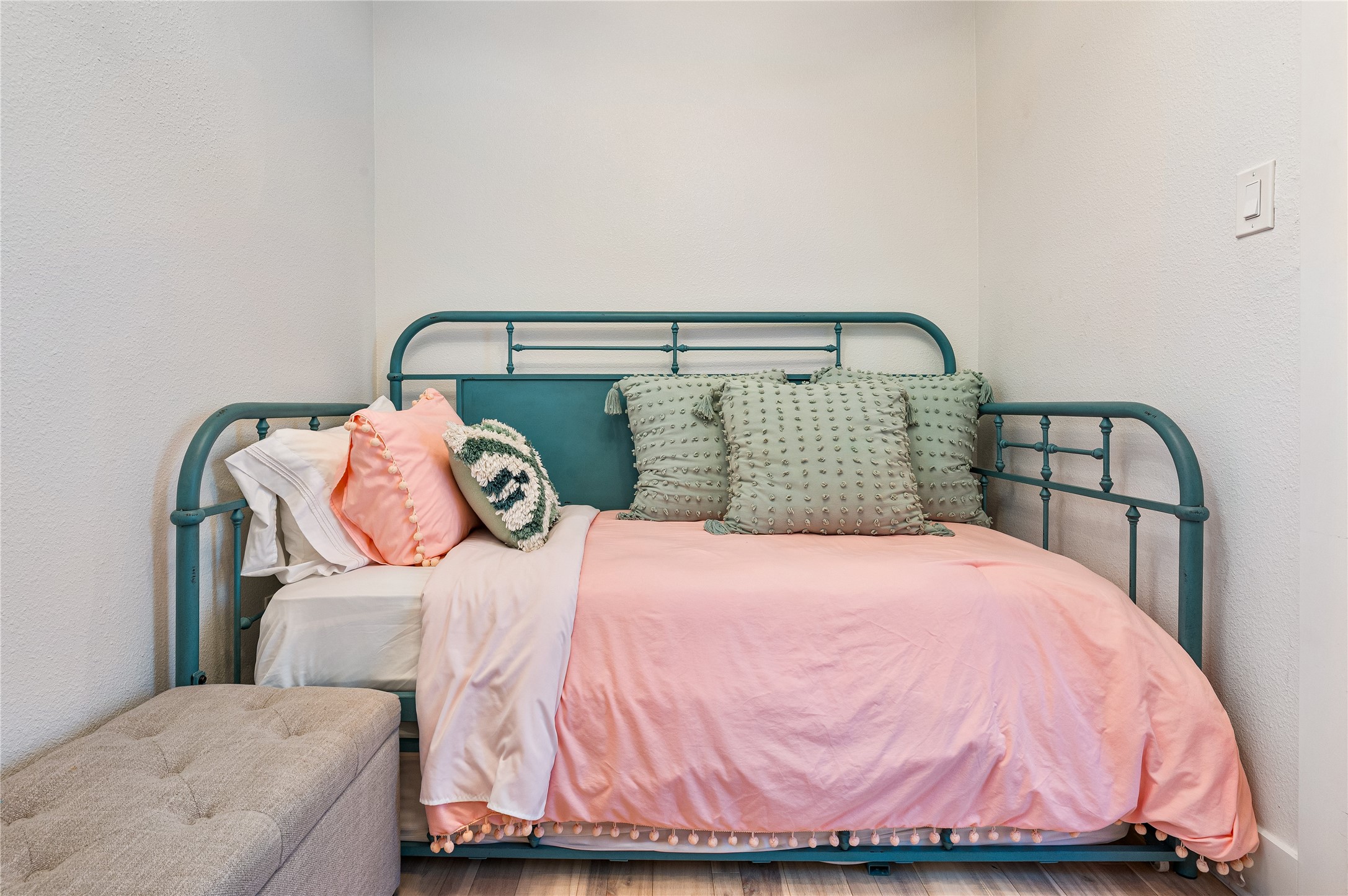 3817 Avenue R Galveston, TX 77550 - Photo 20 of 35 a bedroom with a bed and a mirror