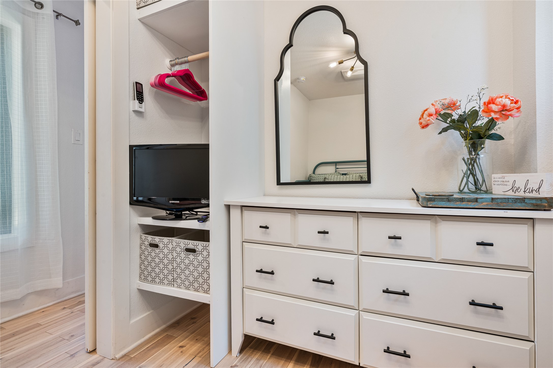 3817 Avenue R Galveston, TX 77550 - Photo 21 of 35 a bathroom with a sink vanity and a mirror
