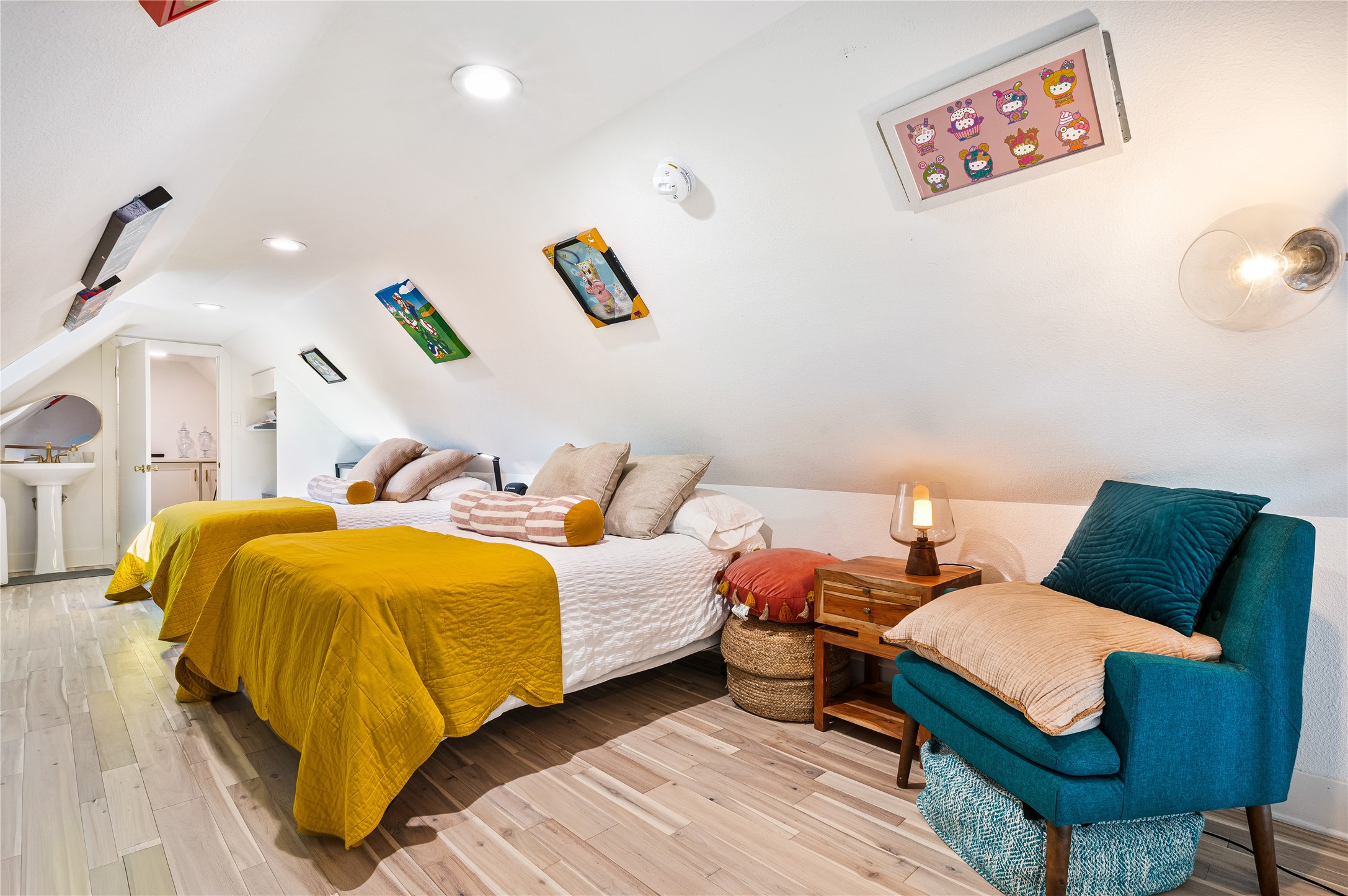 3817 Avenue R Galveston, TX 77550 - Photo 23 of 35 a bedroom with bed and a couch