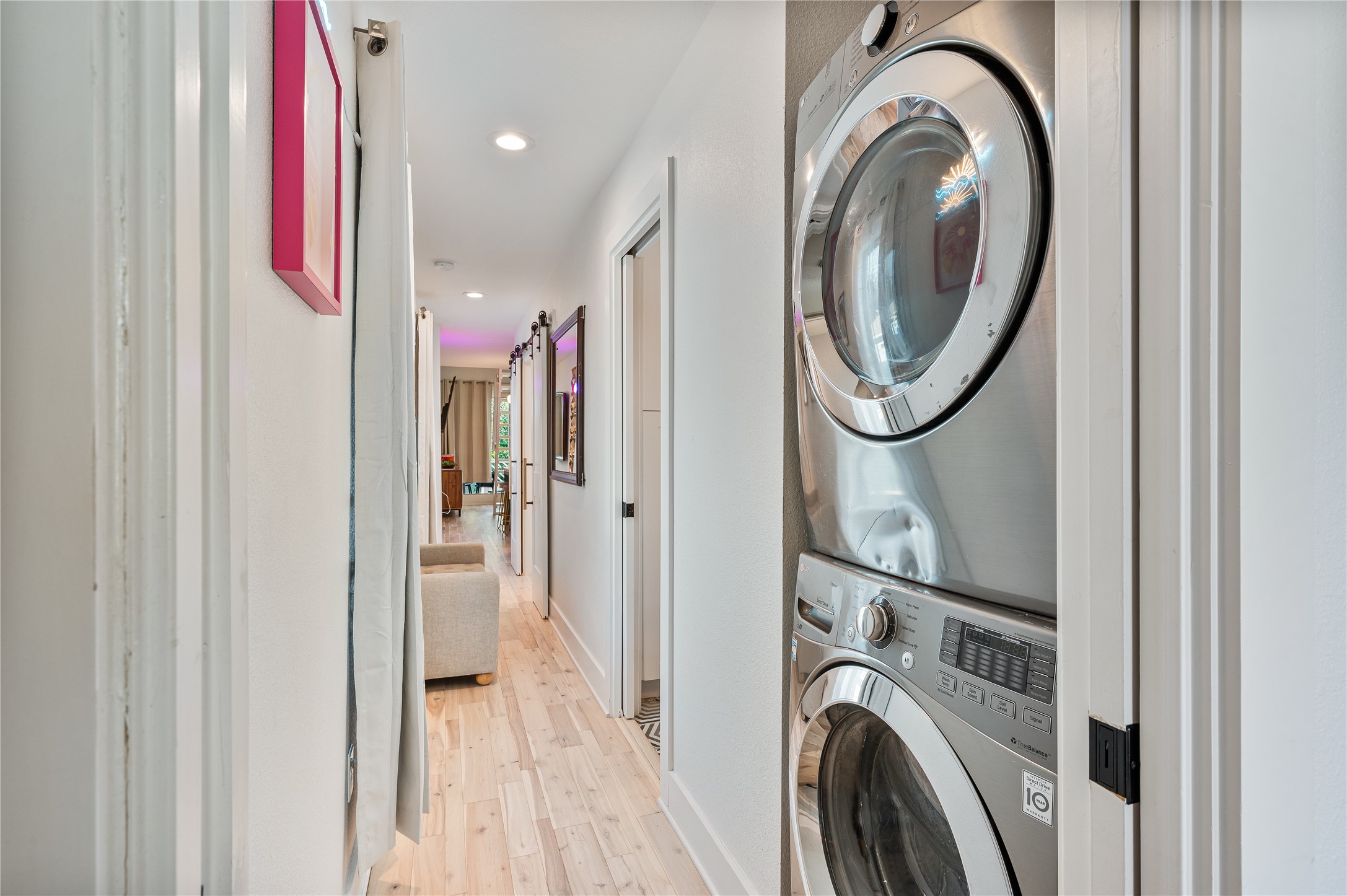 3817 Avenue R Galveston, TX 77550 - Photo 27 of 35 a view of a hallway with washer and dryer