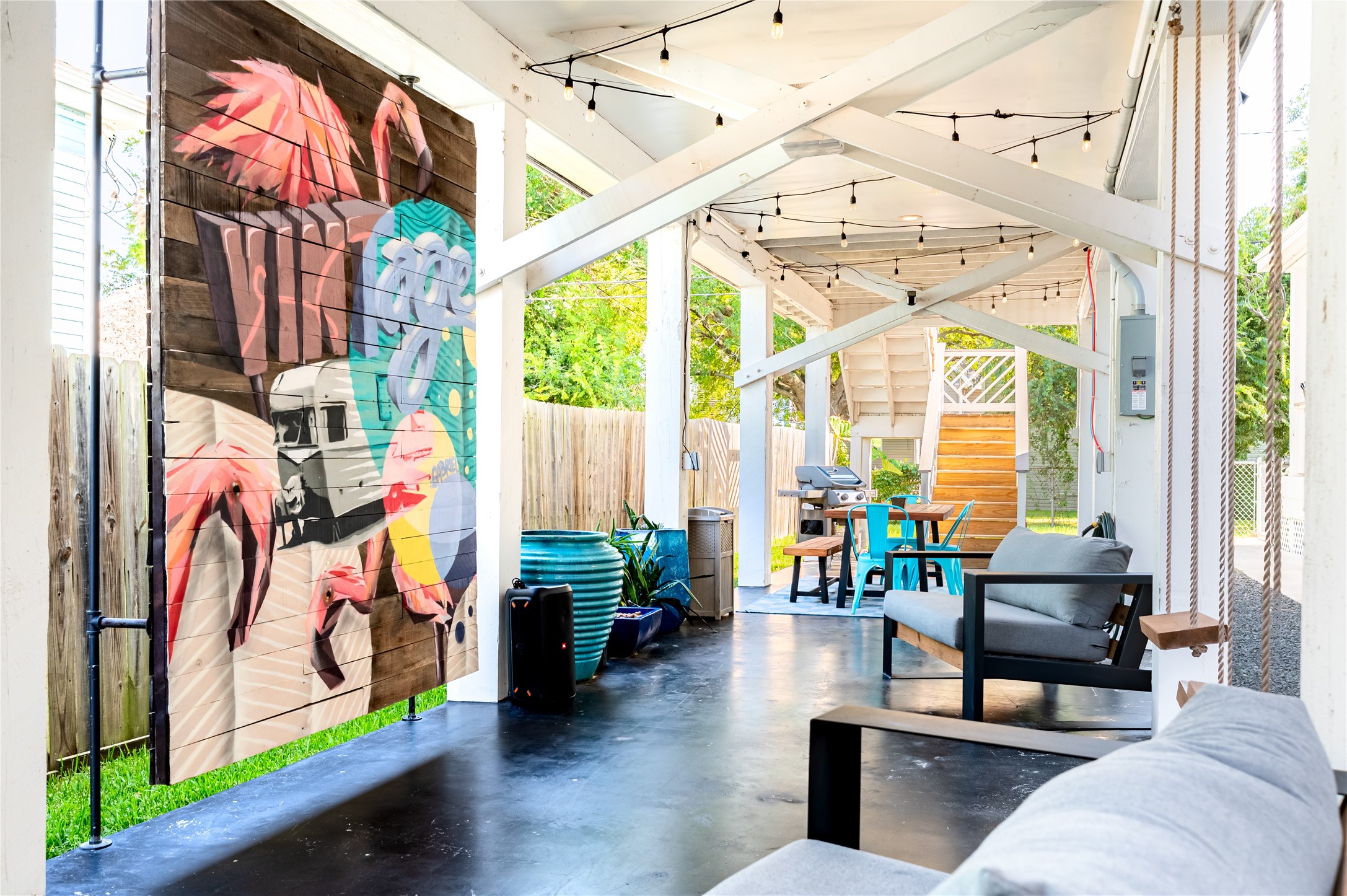 3817 Avenue R Galveston, TX 77550 - Photo 29 of 35 a living room with furniture and a large window
