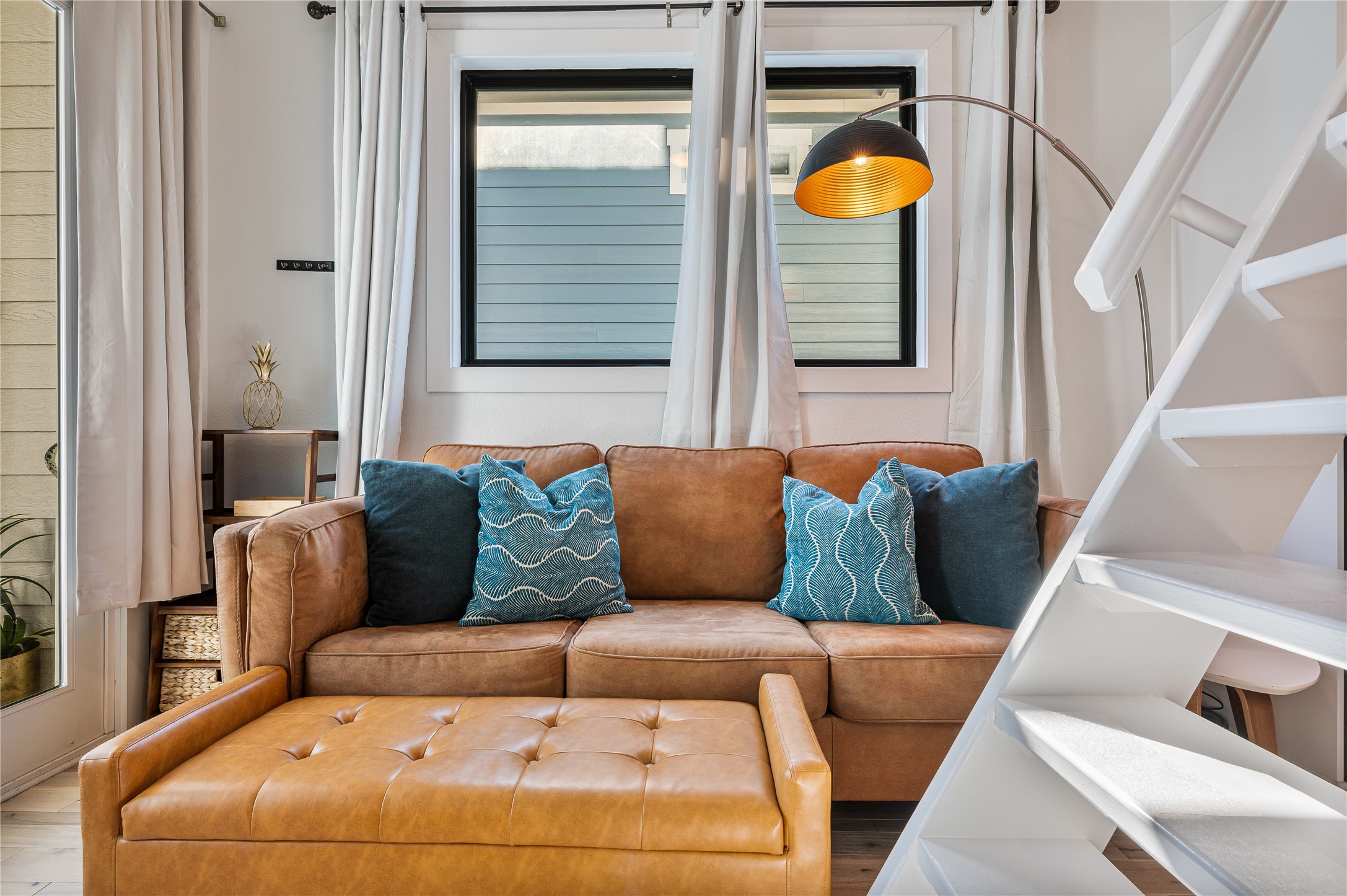 3817 Avenue R Galveston, TX 77550 - Photo 5 of 35 a living room with furniture and a window