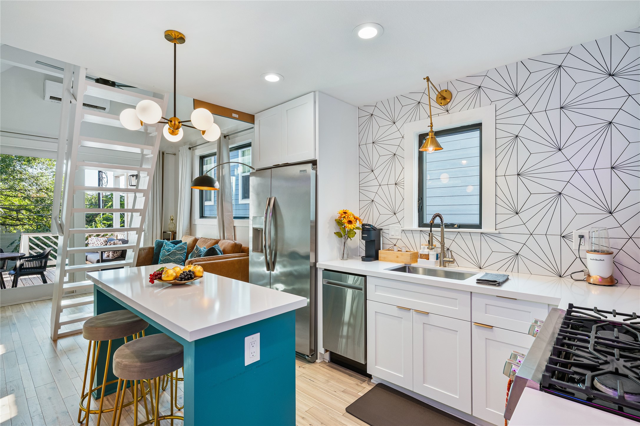 3817 Avenue R Galveston, TX 77550 - Photo 9 of 35 a kitchen with sink cabinets and window