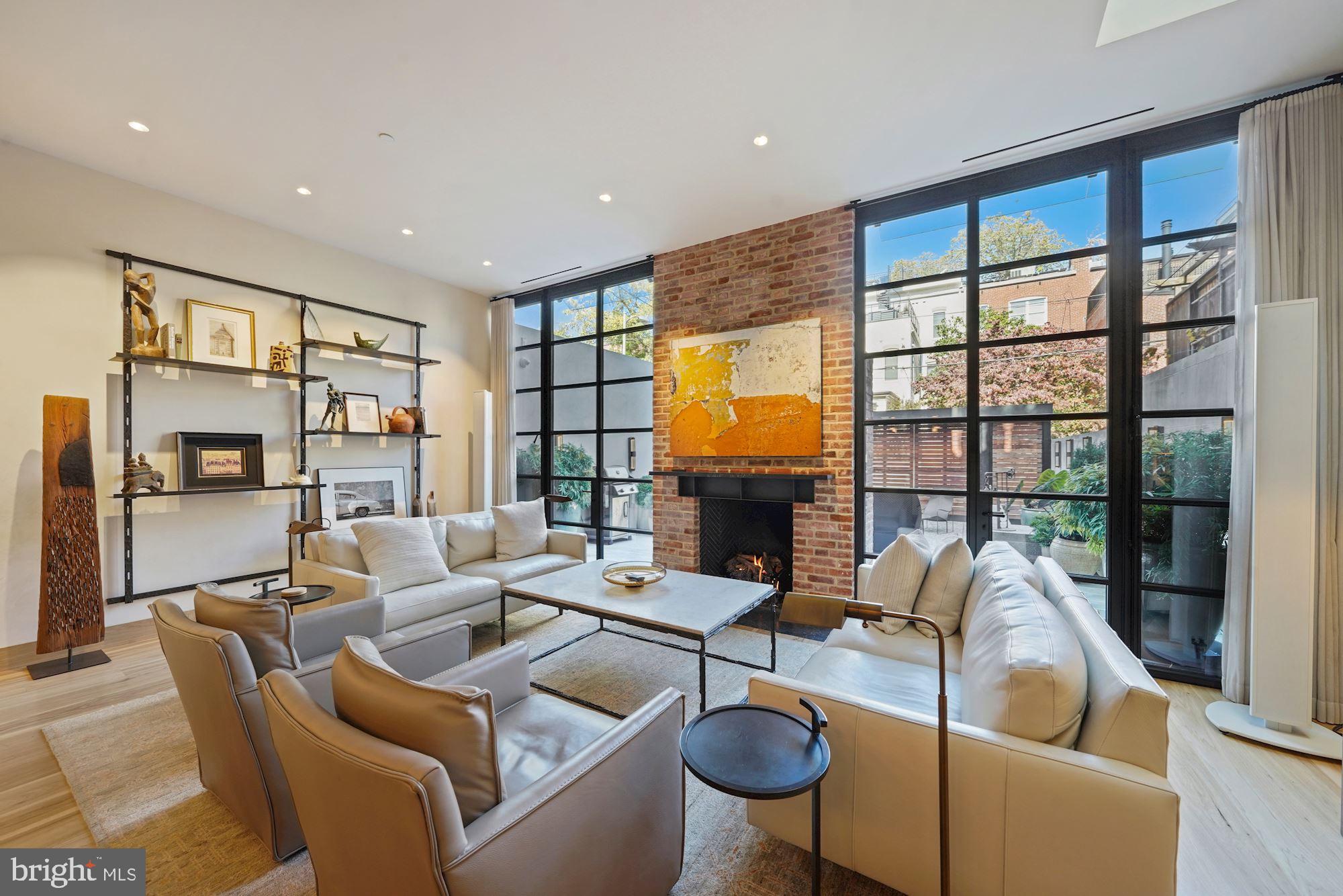 1711 S Street Northwest Washington, DC 20009 - Photo 13 of 50 Living Area w/fireplace and Italian steel windows