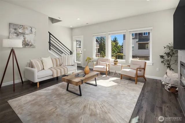 a living room with furniture and a table