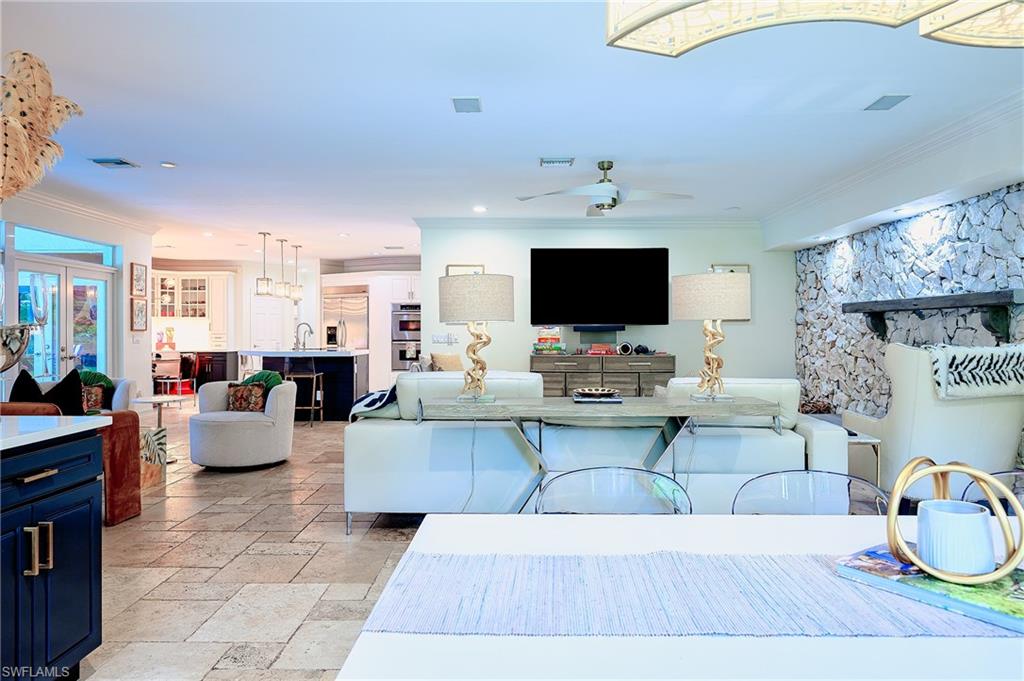 2760 70th Street Southwest Naples, FL 34105 - Photo 16 of 46 Looking toward TV area and Kitchen from Dining area