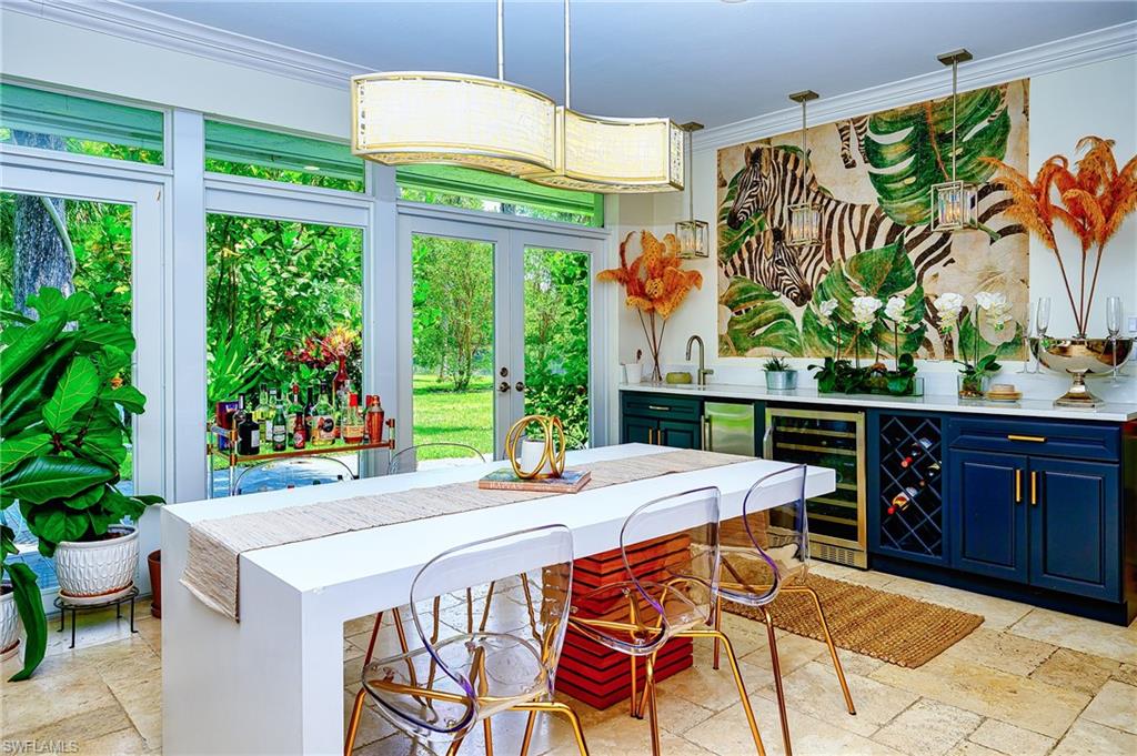 2760 70th Street Southwest Naples, FL 34105 - Photo 6 of 46 Dining area featuring Wet bar!