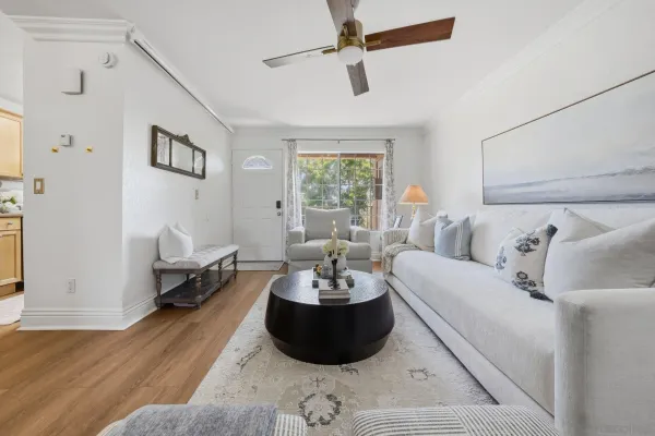 a living room with furniture and a window