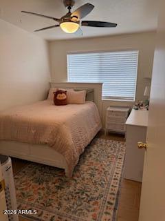 512 West 17th Street Tempe, AZ 85281 - Photo 8 of 13 a bedroom with a bed and a window