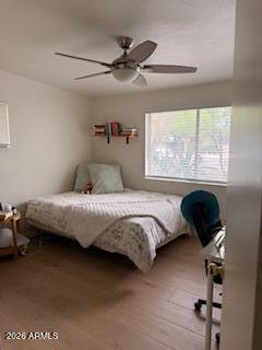 512 West 17th Street Tempe, AZ 85281 - Photo 9 of 13 a bedroom with a bed and a window