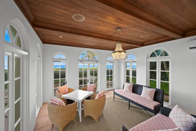 a outdoor living space with furniture and garden view