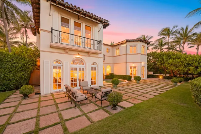 a view of an ocean beach and mountain