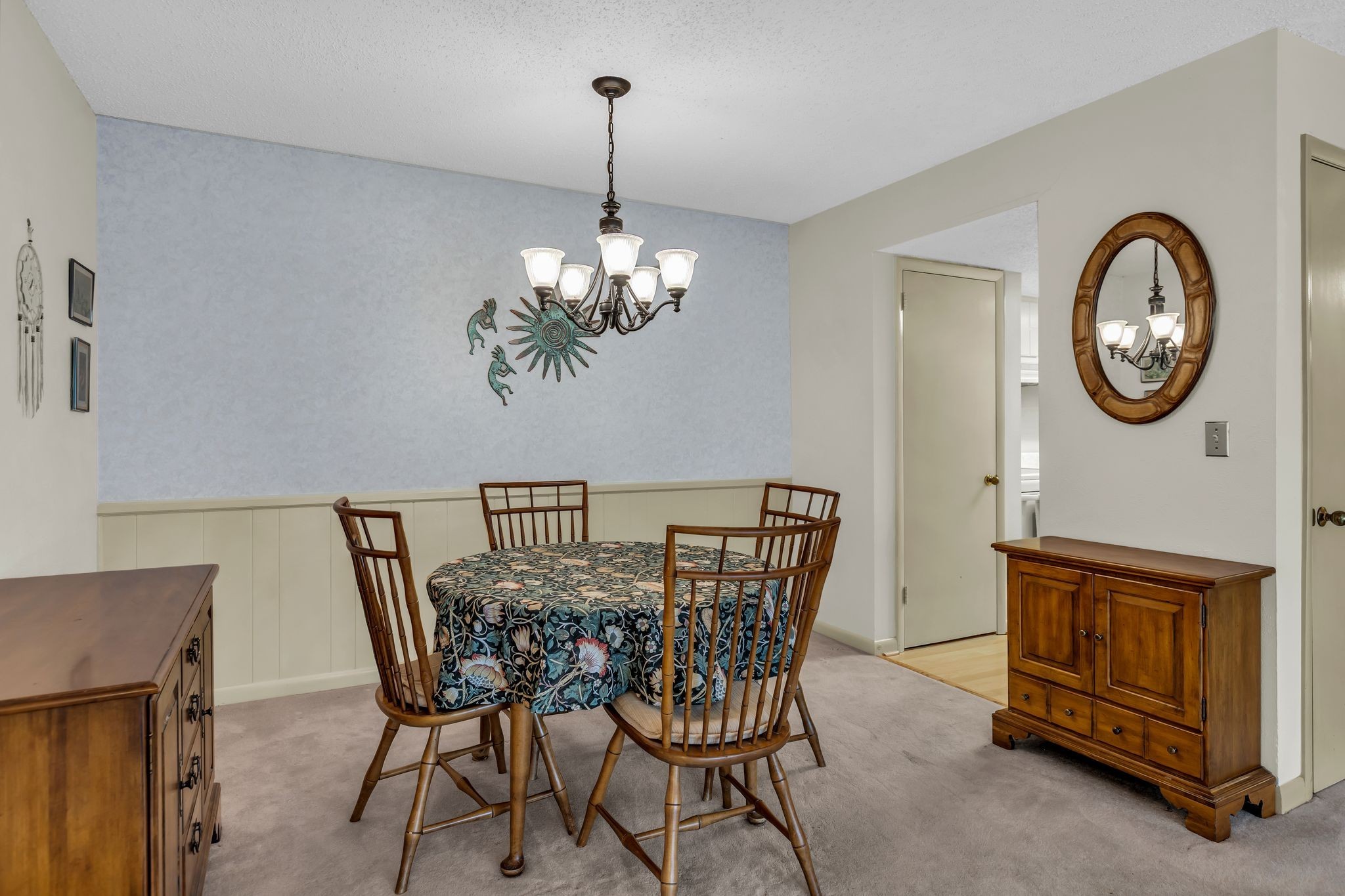 21 Vaughns Gap Road, Unit A22 Nashville, TN 37205 - Photo 11 of 28 a view of a dining room with furniture and chandelier
