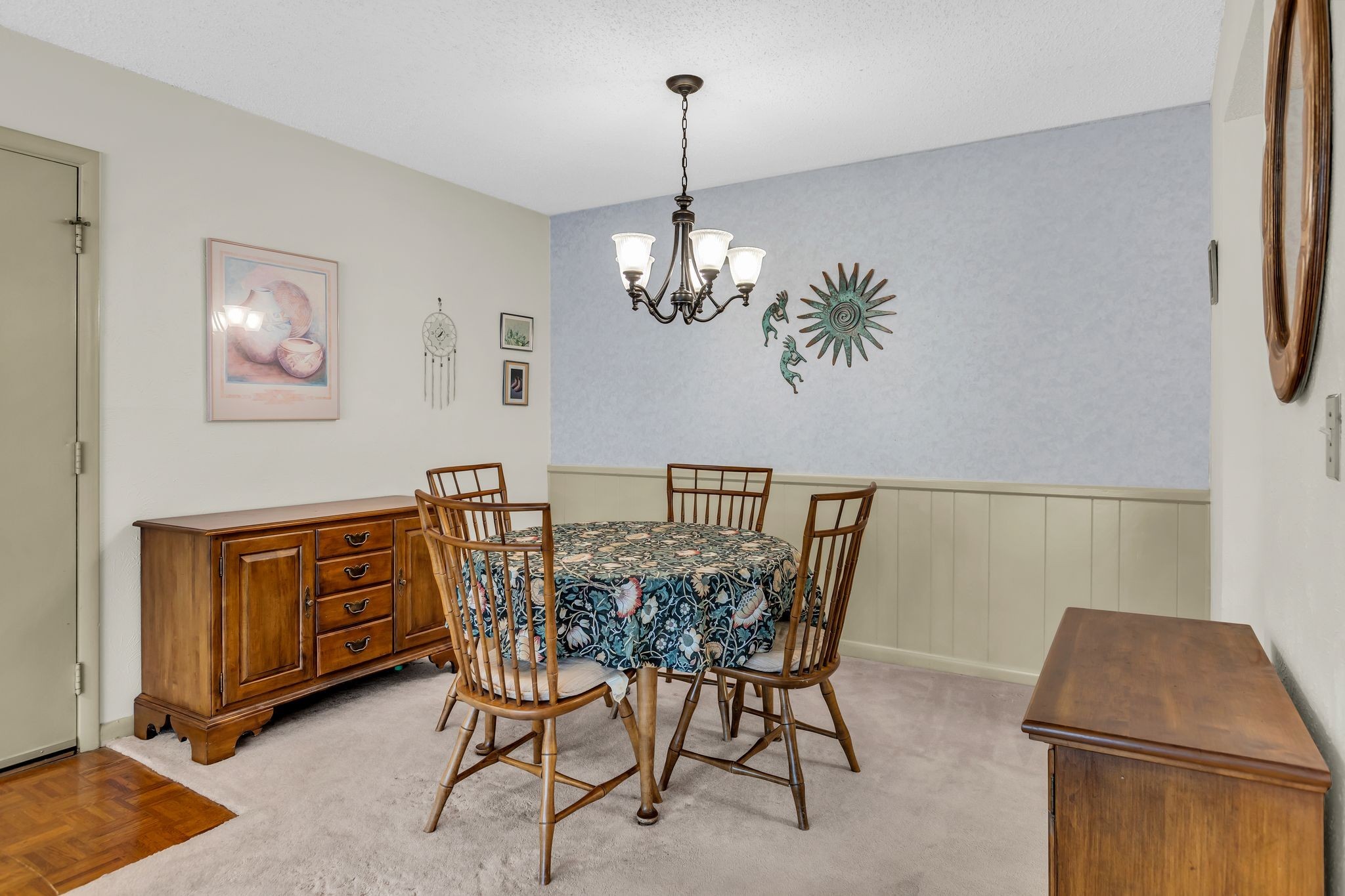 21 Vaughns Gap Road, Unit A22 Nashville, TN 37205 - Photo 12 of 28 a dining room with furniture a chandelier and window
