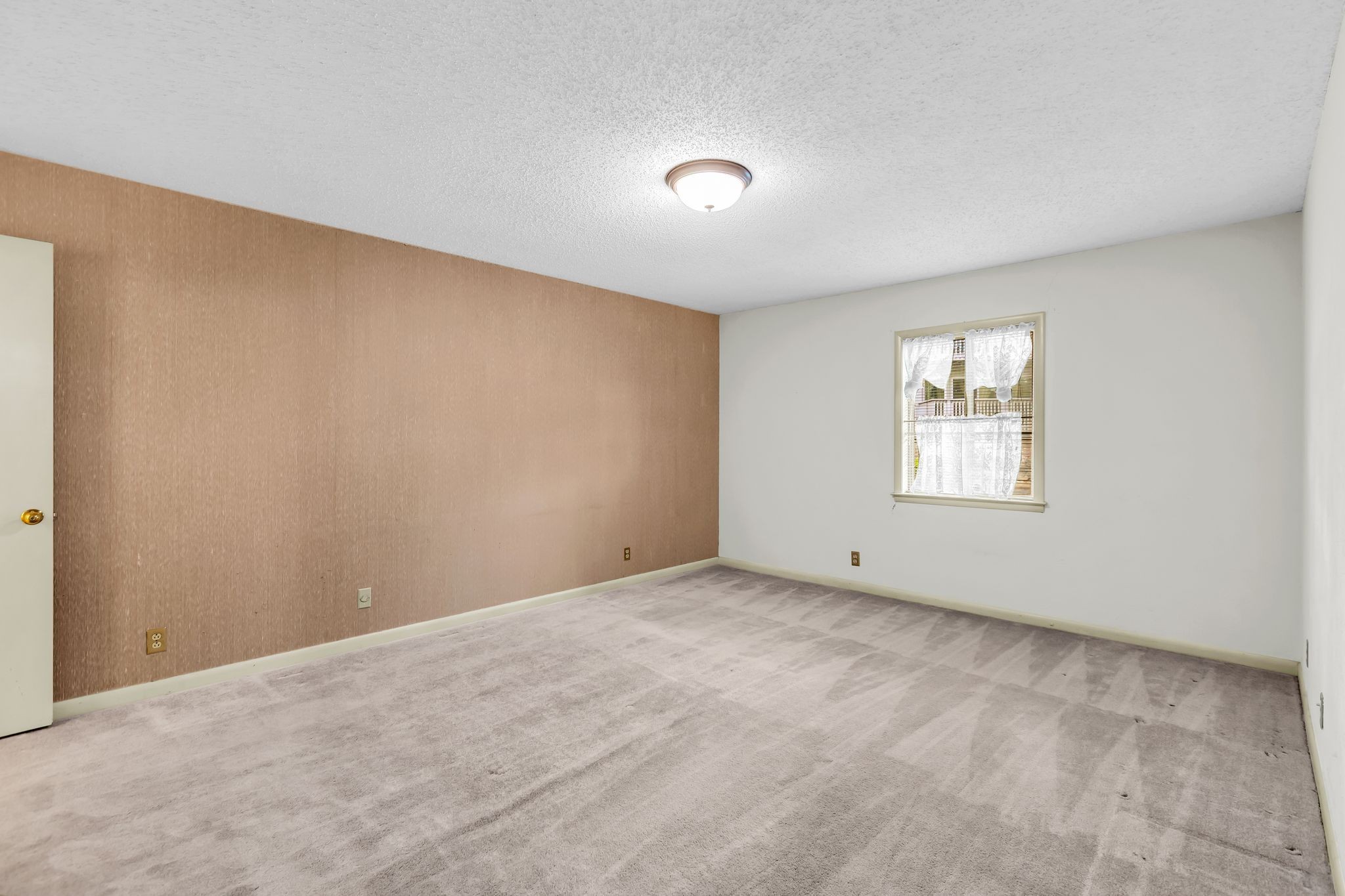 21 Vaughns Gap Road, Unit A22 Nashville, TN 37205 - Photo 17 of 28 a view of an empty room with a window