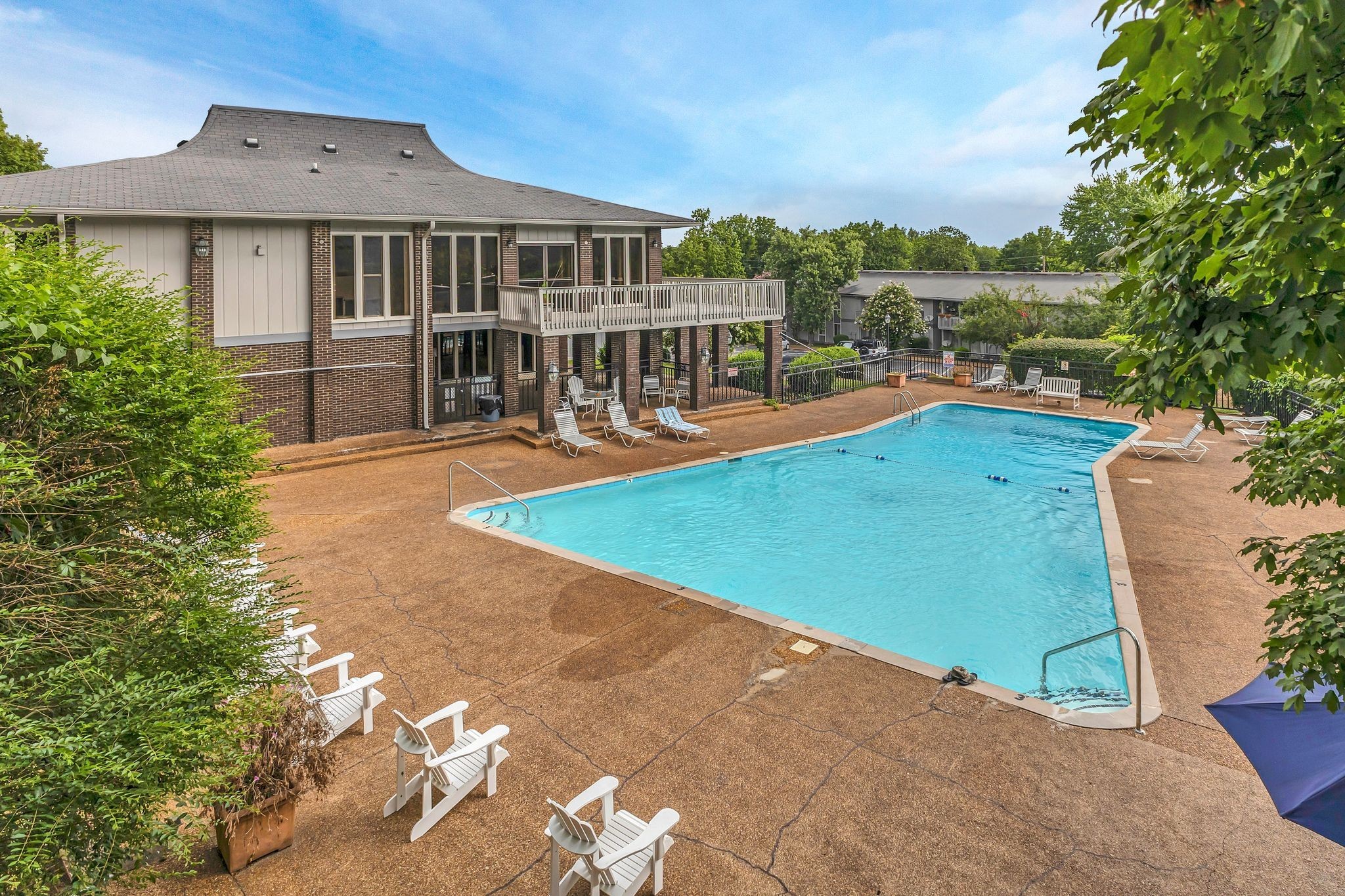 21 Vaughns Gap Road, Unit A22 Nashville, TN 37205 - Photo 27 of 28 a view of a house with pool and a yard