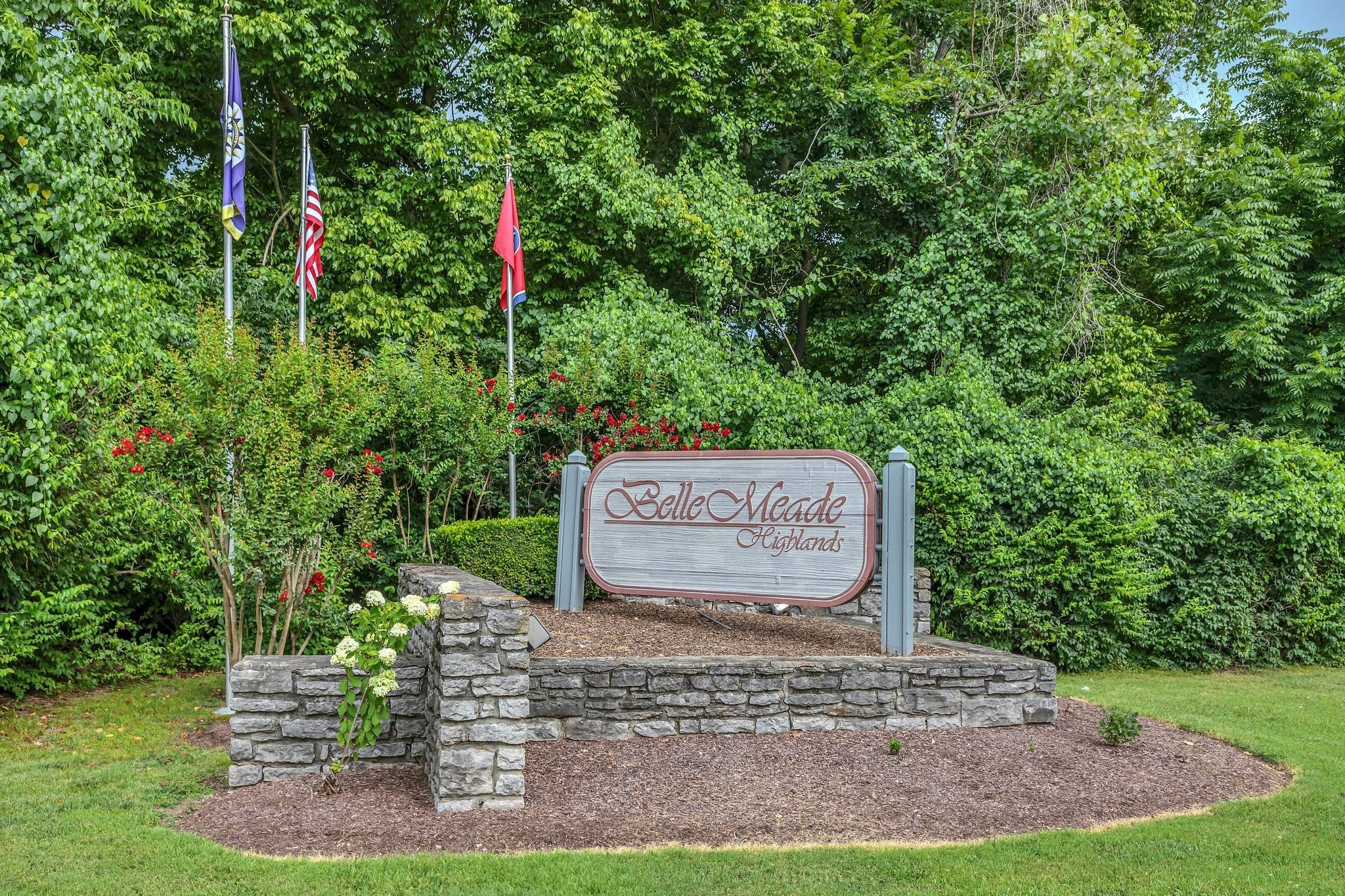 21 Vaughns Gap Road, Unit A22 Nashville, TN 37205 - Photo 28 of 28 a sign that is sitting on a brick road