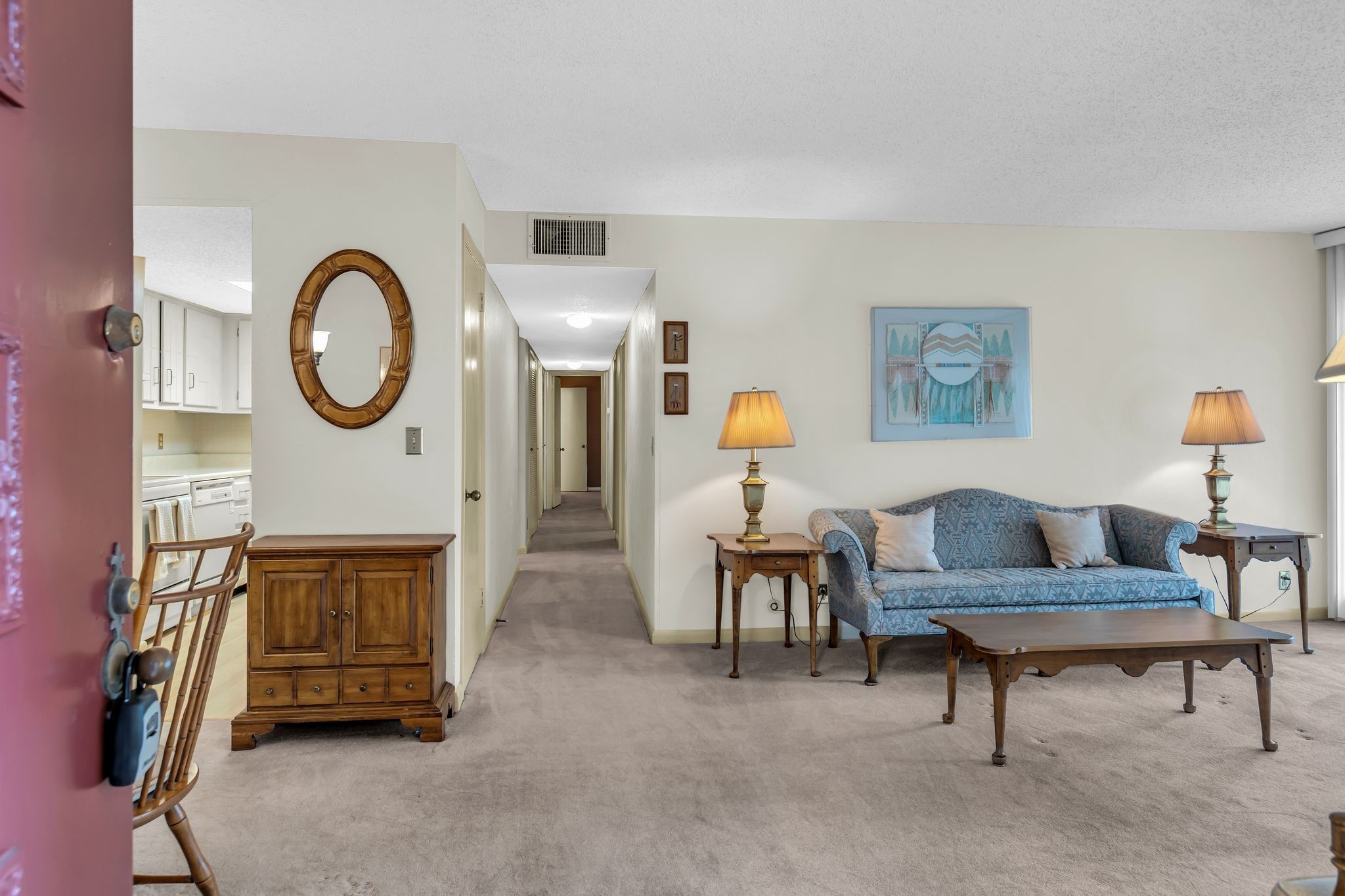 21 Vaughns Gap Road, Unit A22 Nashville, TN 37205 - Photo 6 of 28 a living room with furniture a couch and a potted plant