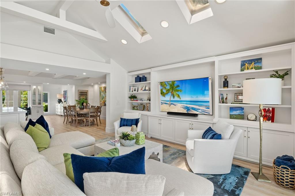 1960 Tarpon Road Naples, FL 34102 - Photo 23 of 49 a living room with furniture and a flat screen tv