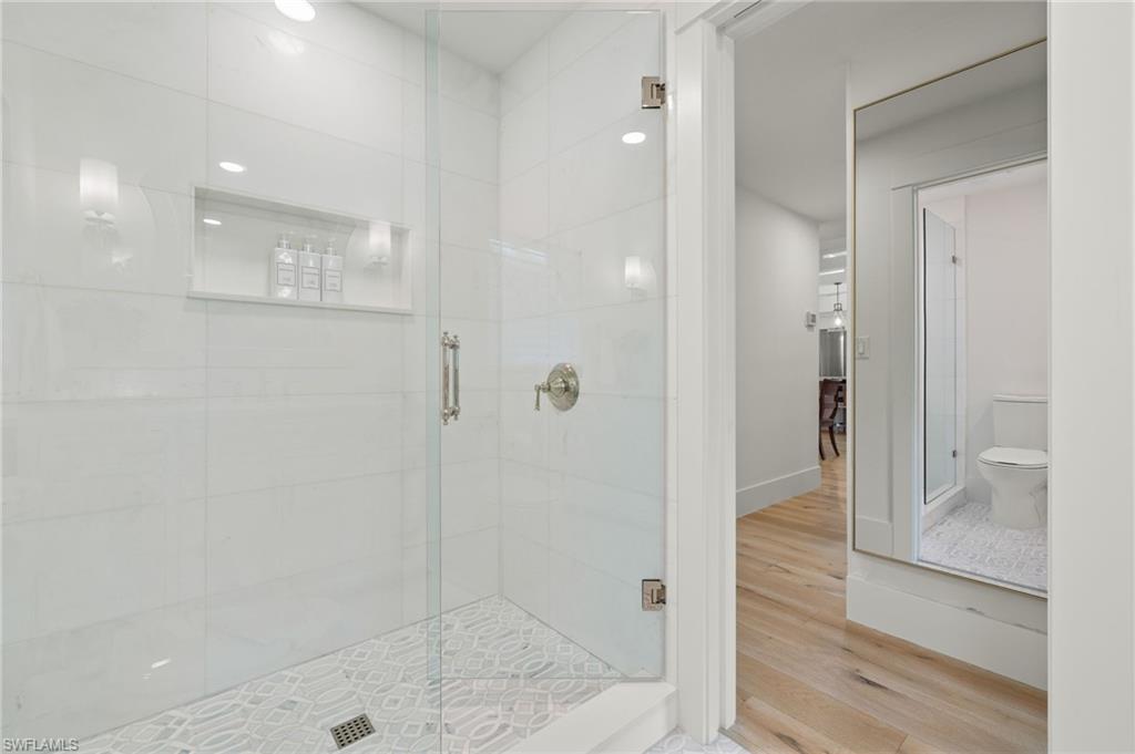 1960 Tarpon Road Naples, FL 34102 - Photo 34 of 49 a bathroom with a shower
