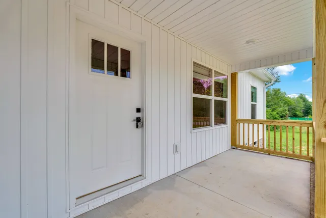 a view of front door and porch