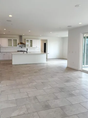 a view of a livingroom with furniture and fireplace