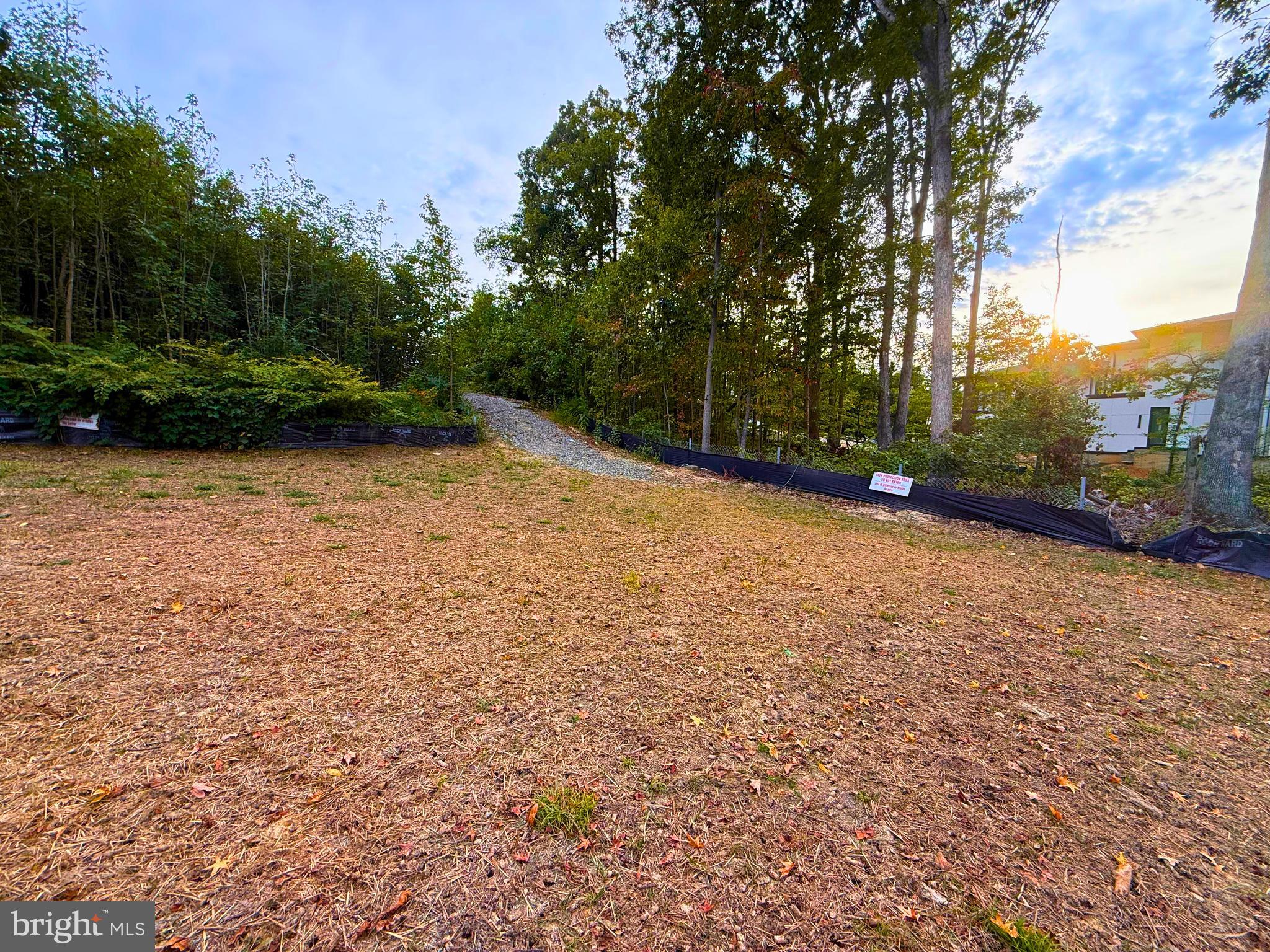 8811 Ox Road Fairfax Station, VA 22039 - Photo 3 of 12 a backyard of a house with lots of green space