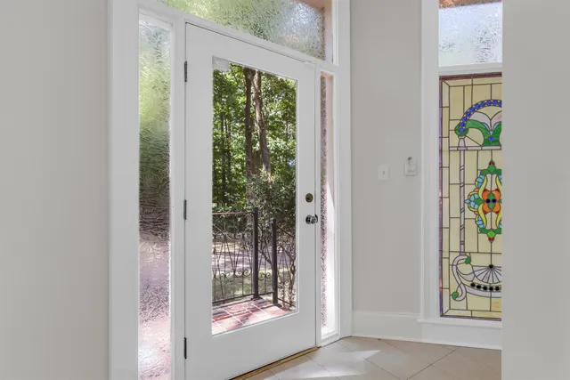 a bathroom with a tub and shower