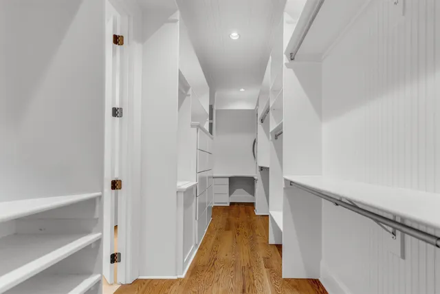 a view of storage and utility room with empty racks