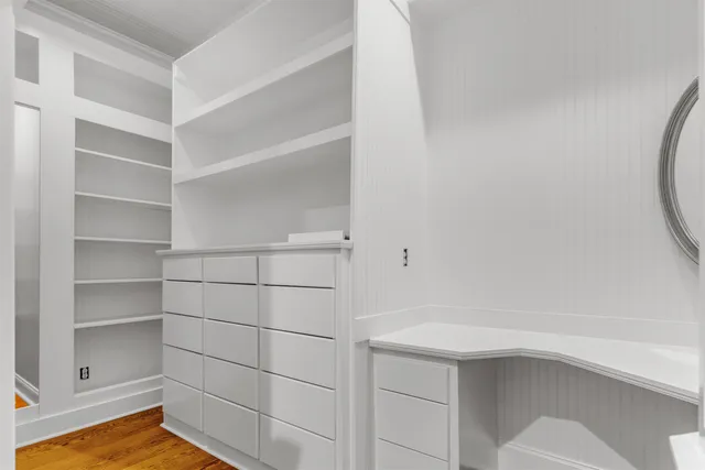 a bathroom with a toilet a sink and shower