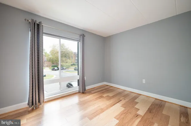 a view of a room that has a window in it