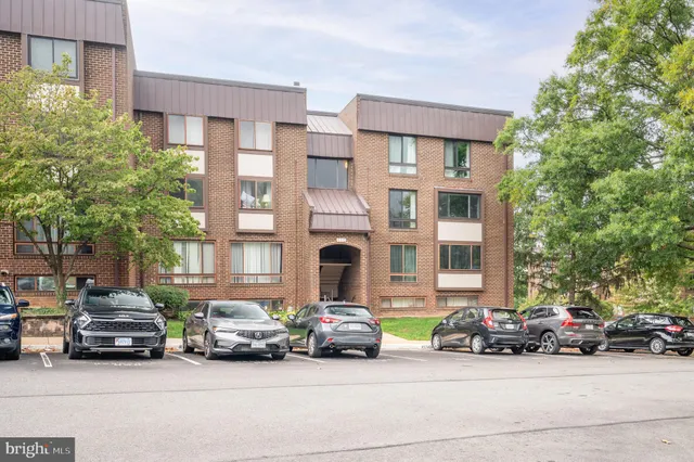 a car parked in front of a building