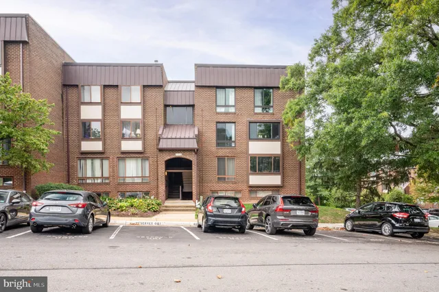 a car parked in front of a building