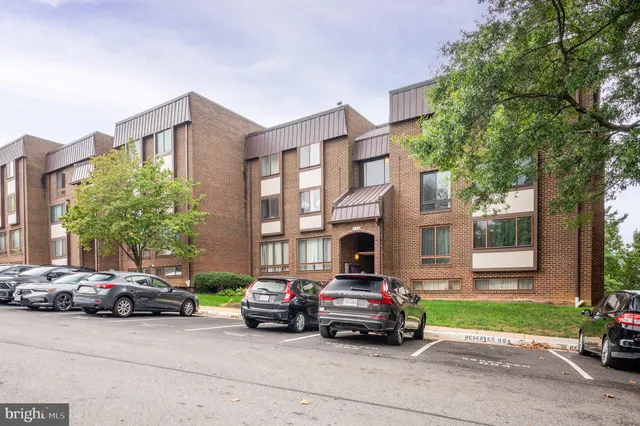 a car parked in front of a building