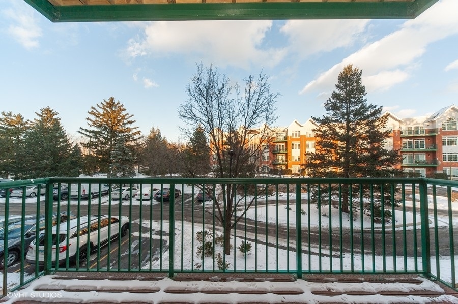 640 McHenry Road, Unit 203 Wheeling, IL 60090 - Photo 14 of 14 a view of a balcony