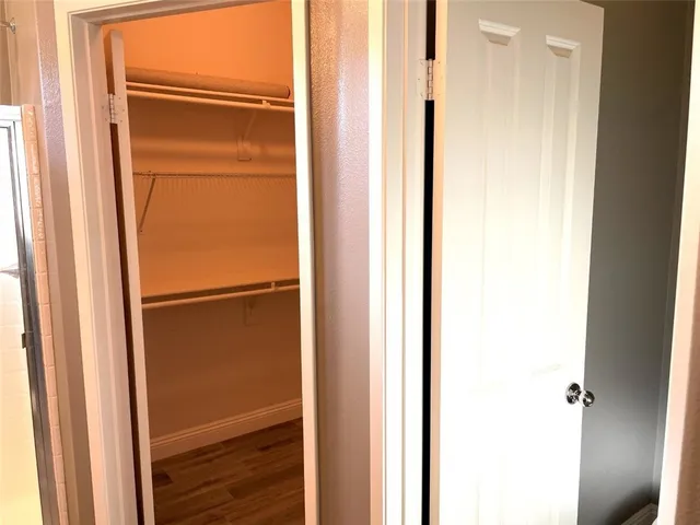 a view of a bathroom from a hallway