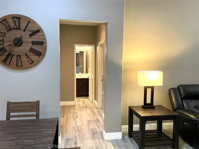 a bathroom with a toilet a sink and a mirror