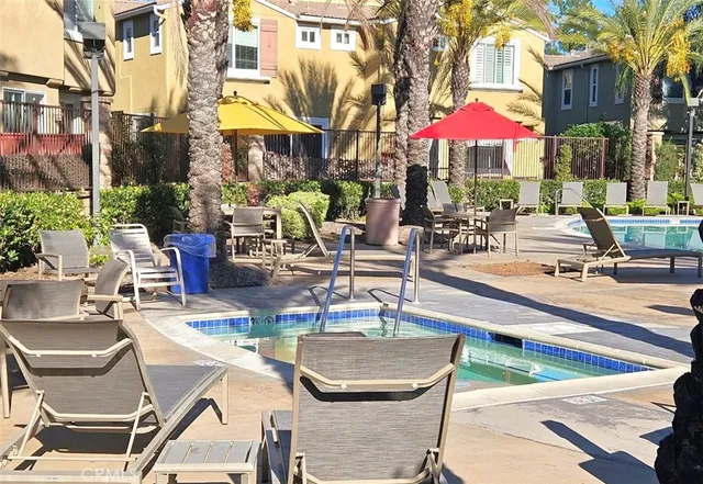 a view of a swimming pool with a patio