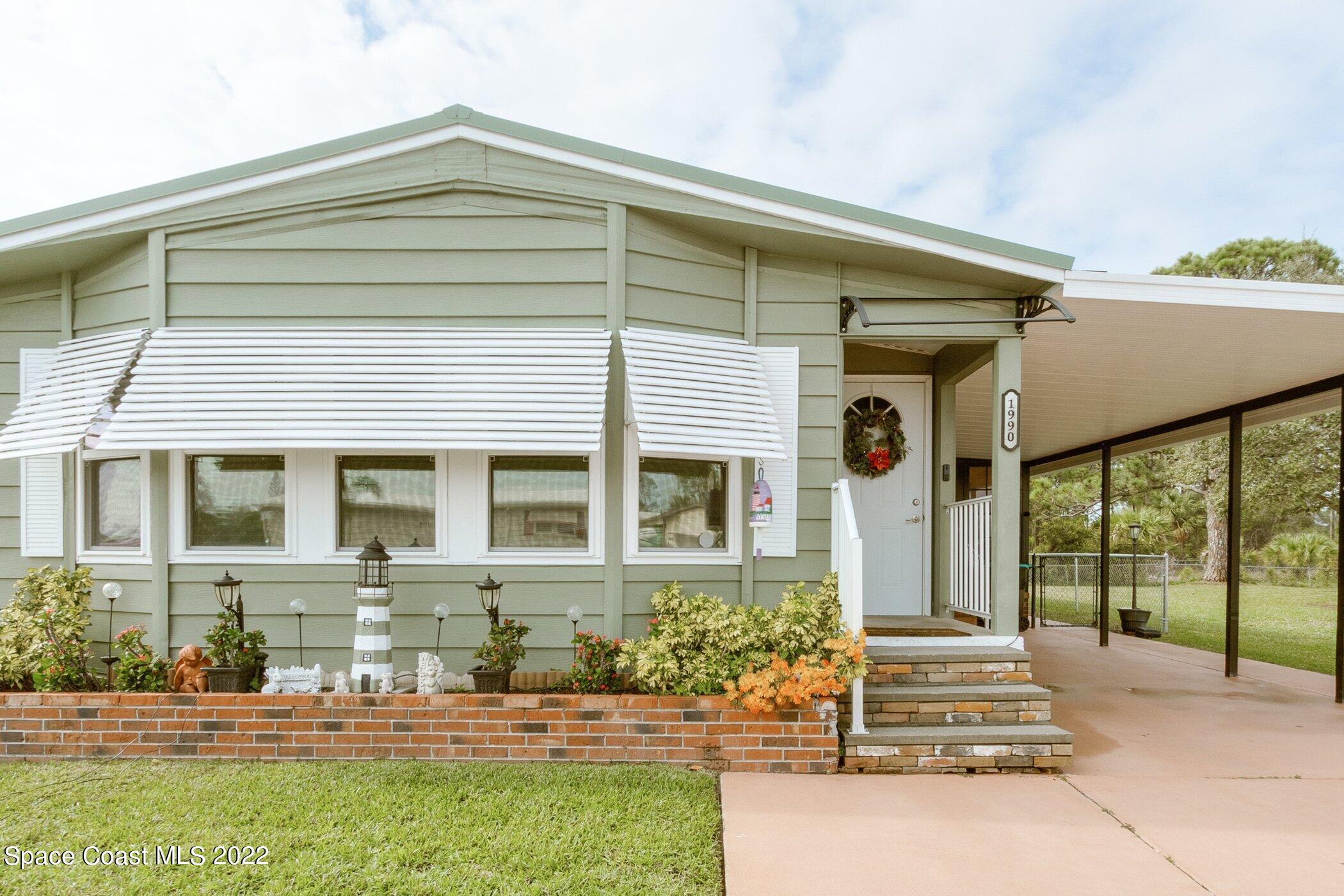 1990 Mango Street Northeast Palm Bay, FL 32905 - Photo 2 of 53 1990-Mango-100.jpg-SMALL