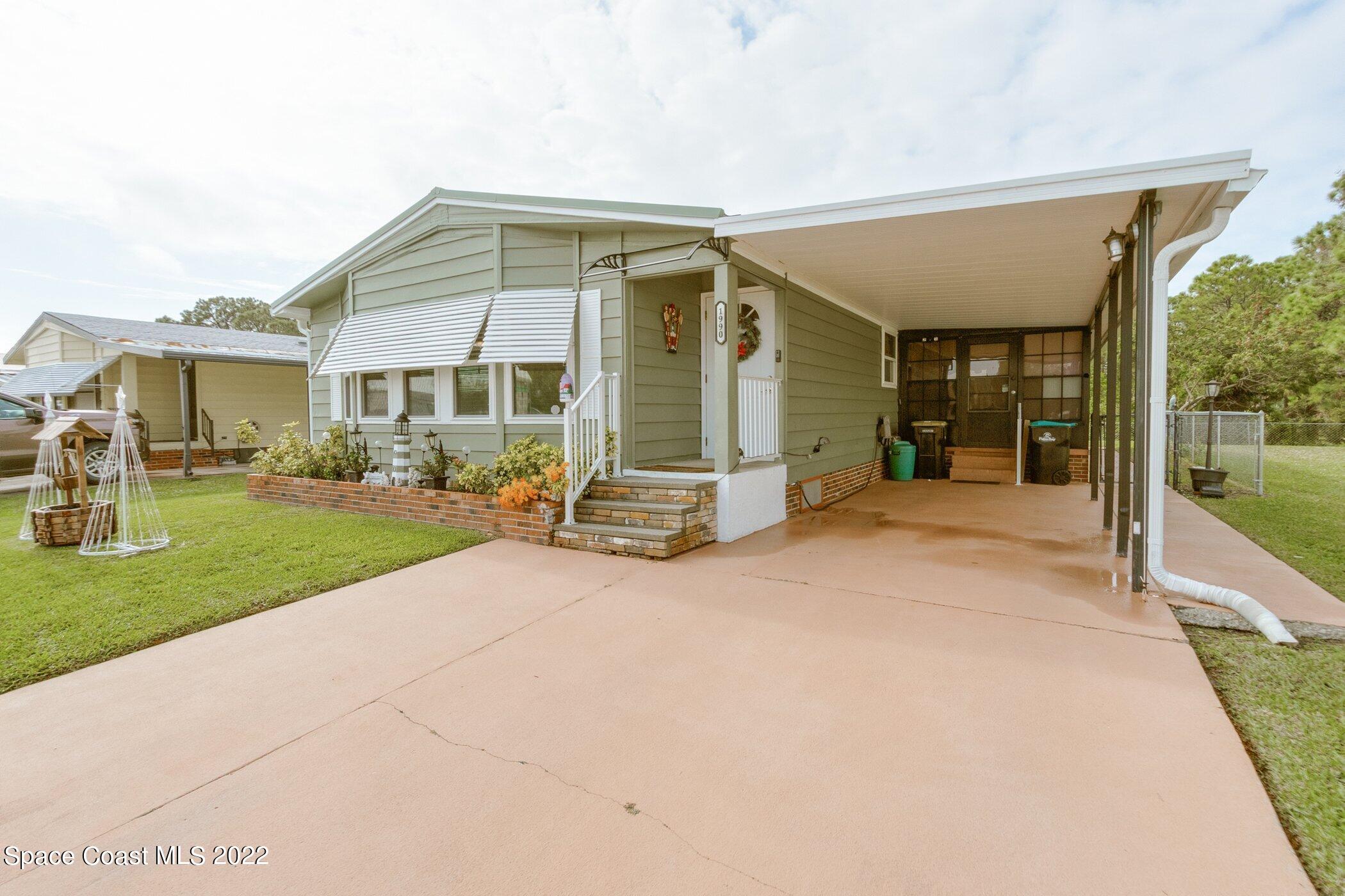 1990 Mango Street Northeast Palm Bay, FL 32905 - Photo 3 of 53 1990-Mango-101.jpg-SMALL