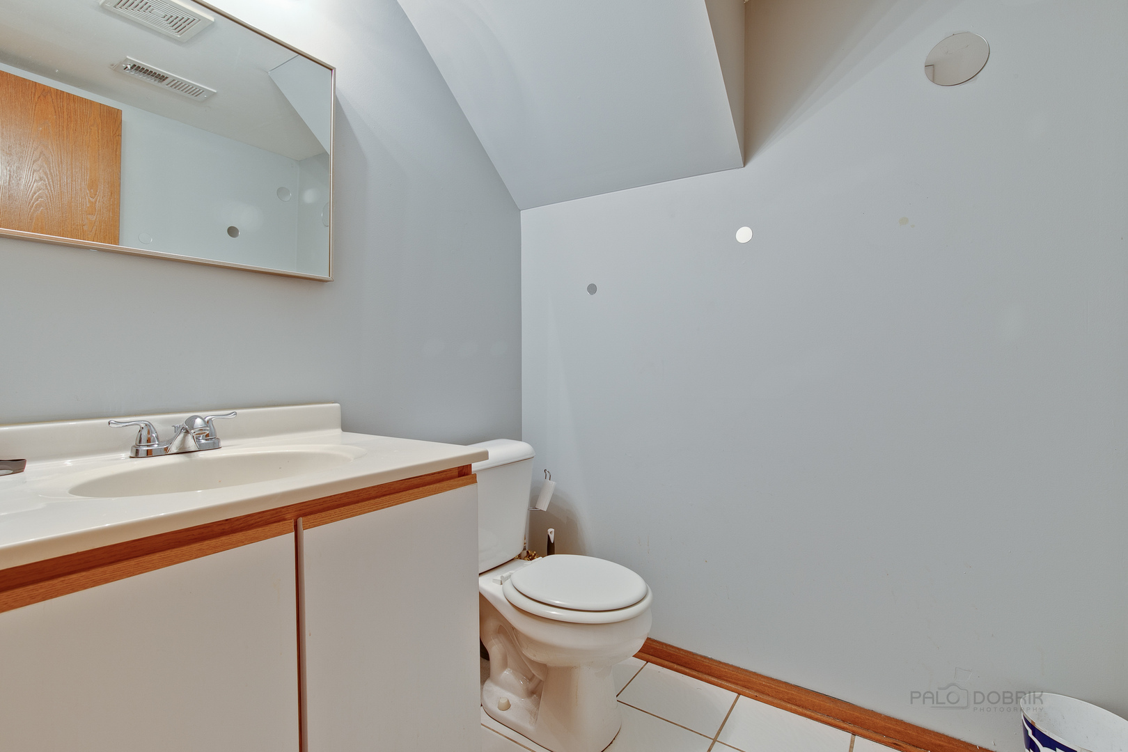 5505 West Cal Sag Road Alsip, IL 60803 - Photo 11 of 14 a bathroom with a sink a toilet and vanity