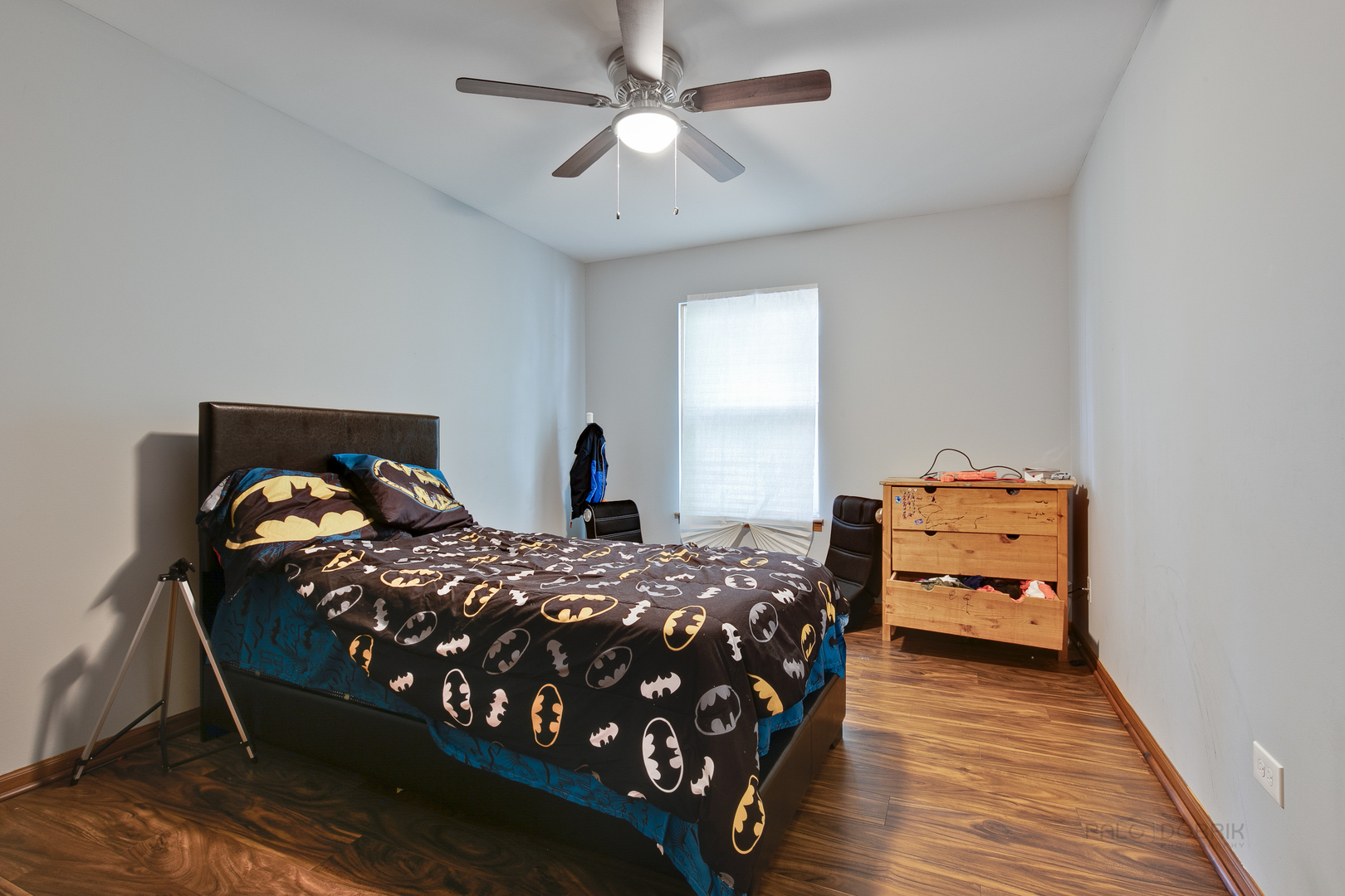 5505 West Cal Sag Road Alsip, IL 60803 - Photo 10 of 14 a bedroom with two beds and wooden floor