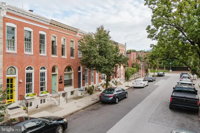 a car parked in front of a building