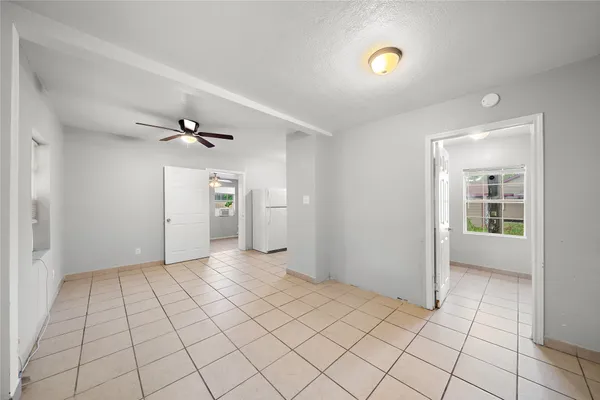 a view of an empty room and window