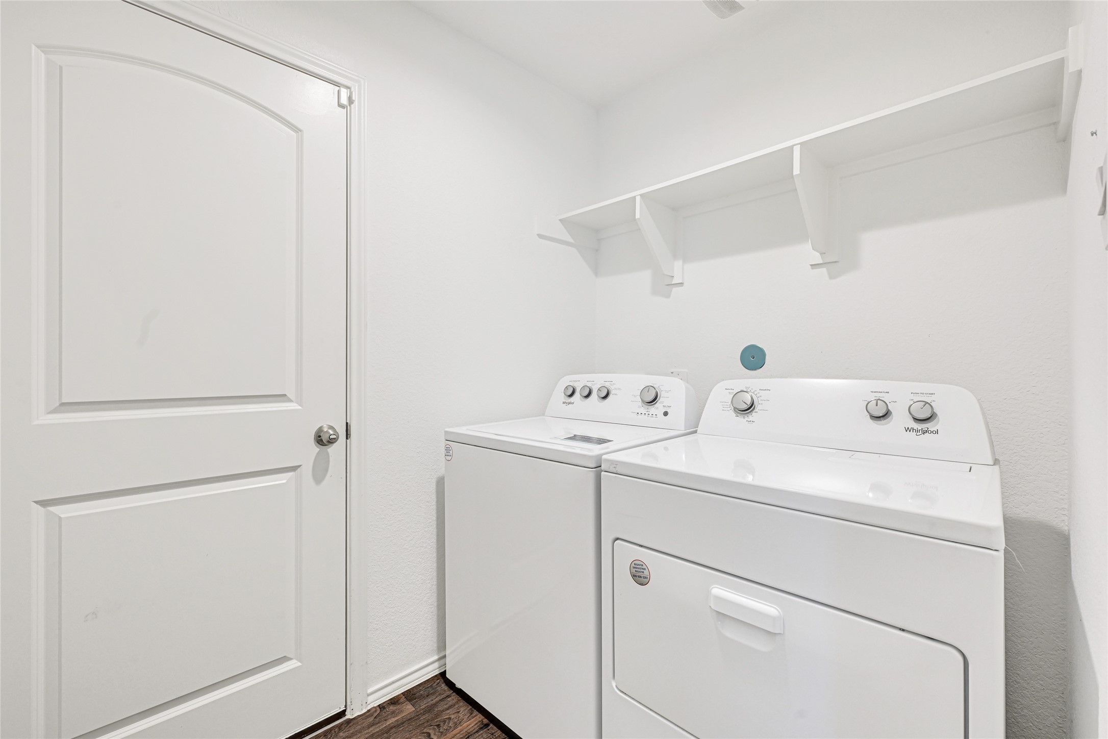 22438 Forest Gorge Lane Spring, TX 77373 - Photo 11 of 20 a view of storage and utility room with washer and dryer