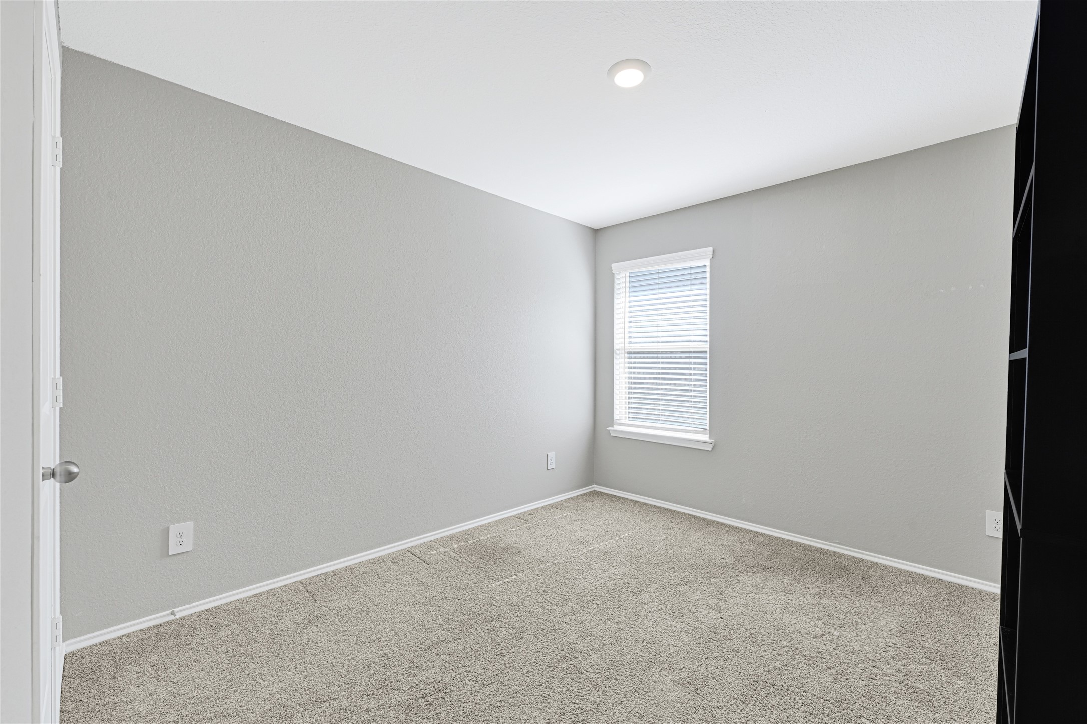 22438 Forest Gorge Lane Spring, TX 77373 - Photo 12 of 20 a view of an empty room with a window