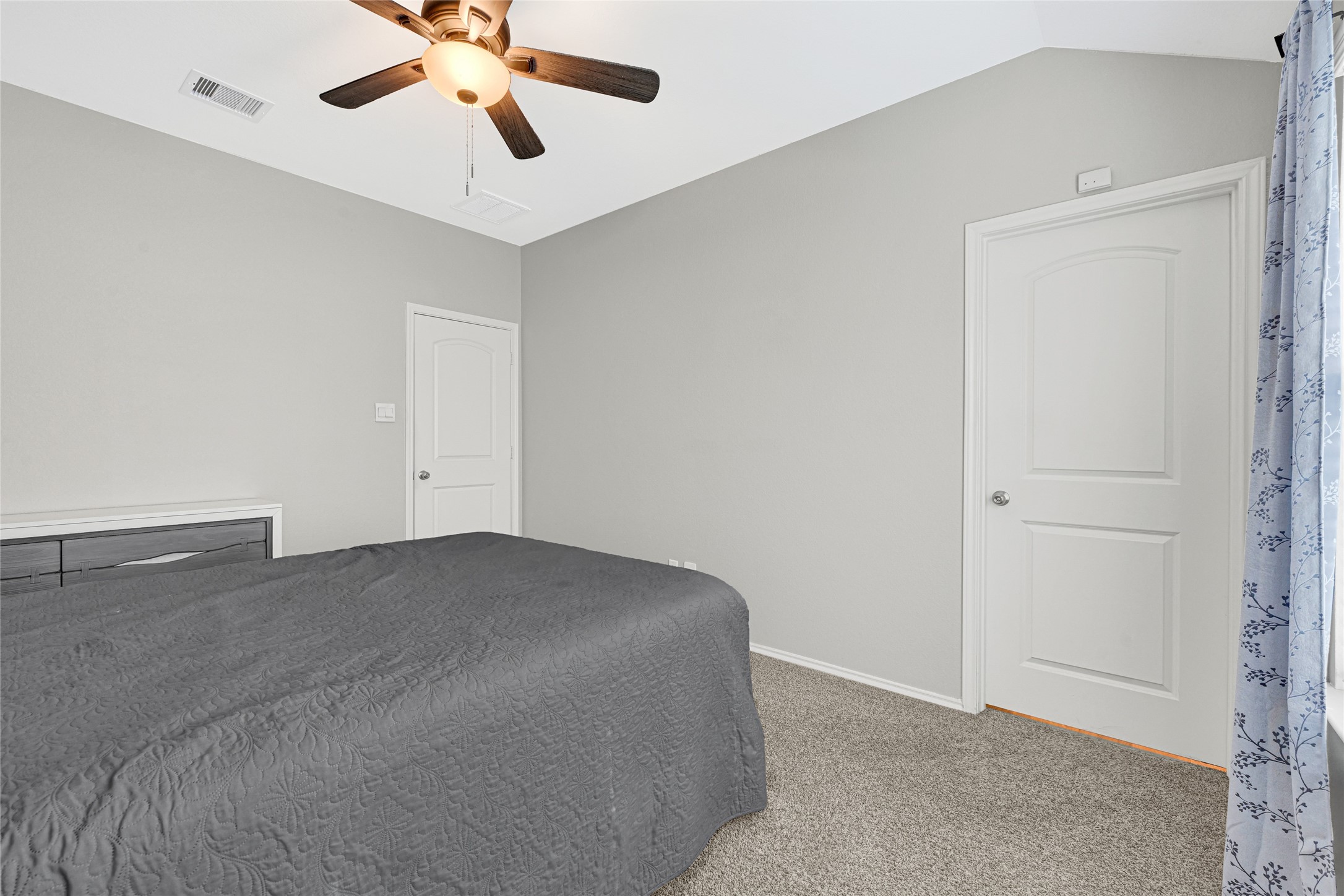 22438 Forest Gorge Lane Spring, TX 77373 - Photo 16 of 20 a view of a room with a ceiling fan and hardwood floor