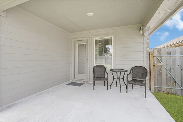 a workspace with furniture and a window